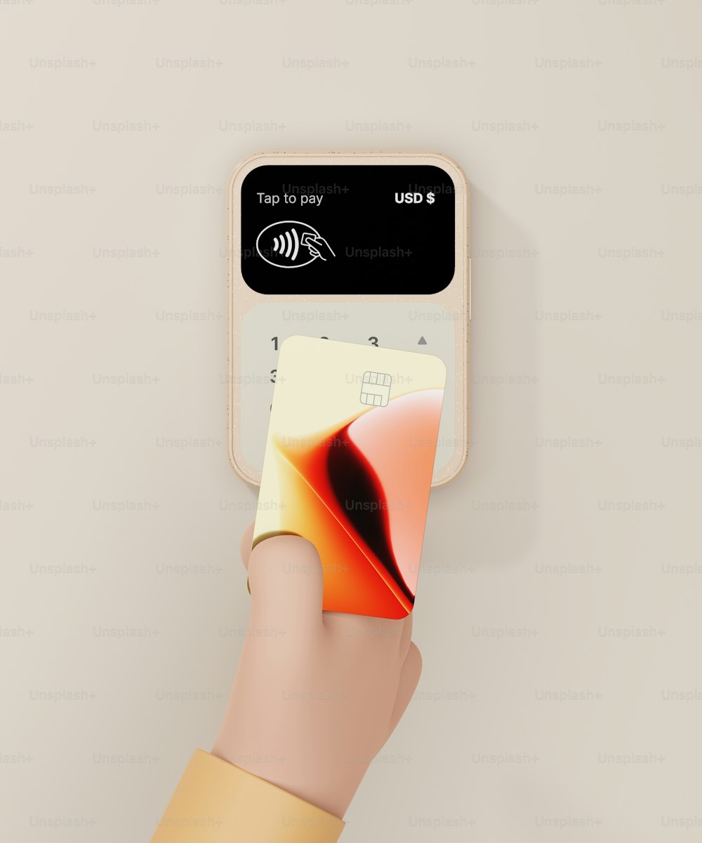 a person holding a credit card in their hand