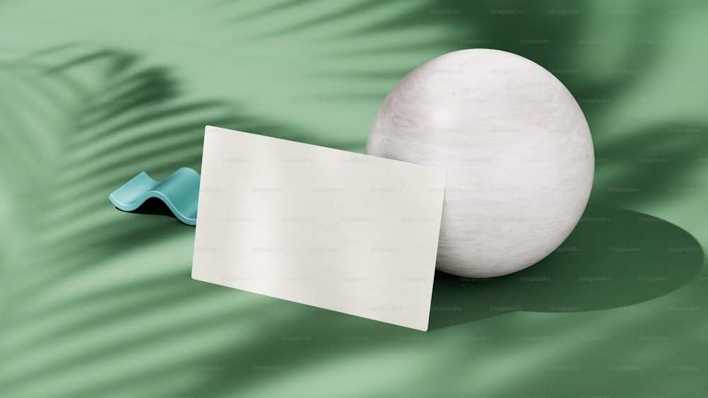 an egg with a piece of paper next to it
