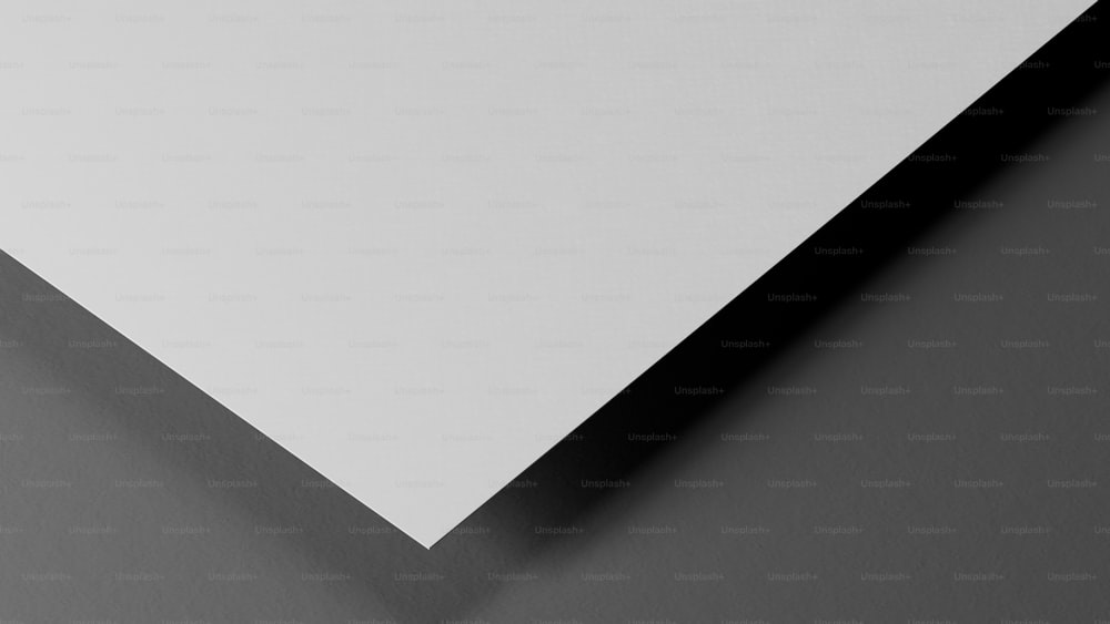a close up of a white and black piece of paper