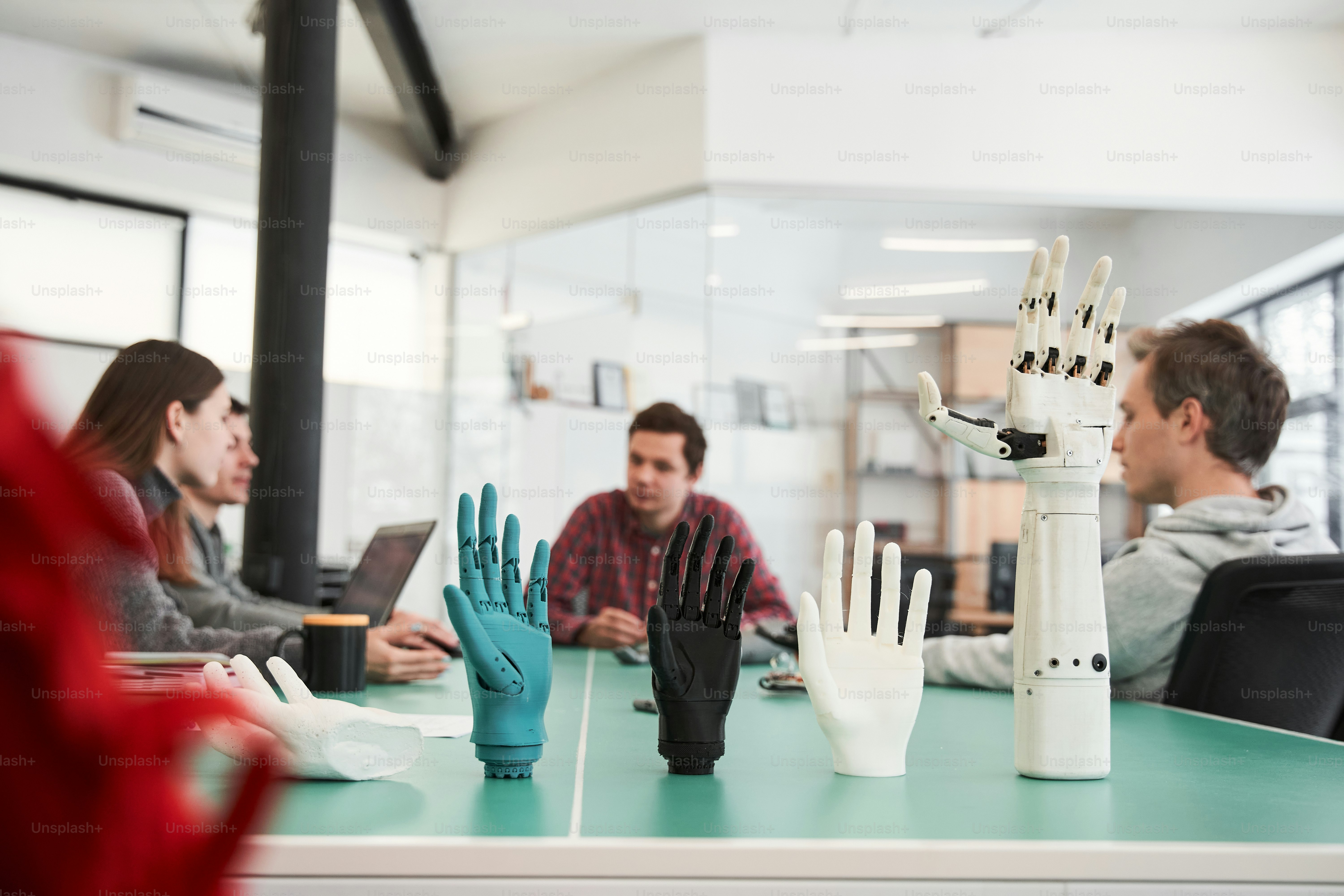 People working in laboratory on creating details of mechanism. Workers ...