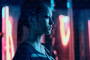 Futuristic portrait of asian teenager in neon light with sword like lamps. She is seriour, daring, cyberpunk fashionable girl with white eyebrows