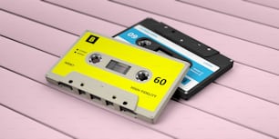 1970년대-1980년대 파티 음악. 빈티지 오디오 카세트 테이프는 분홍색 나무 배경에 분리되어 있다. 3d 그림