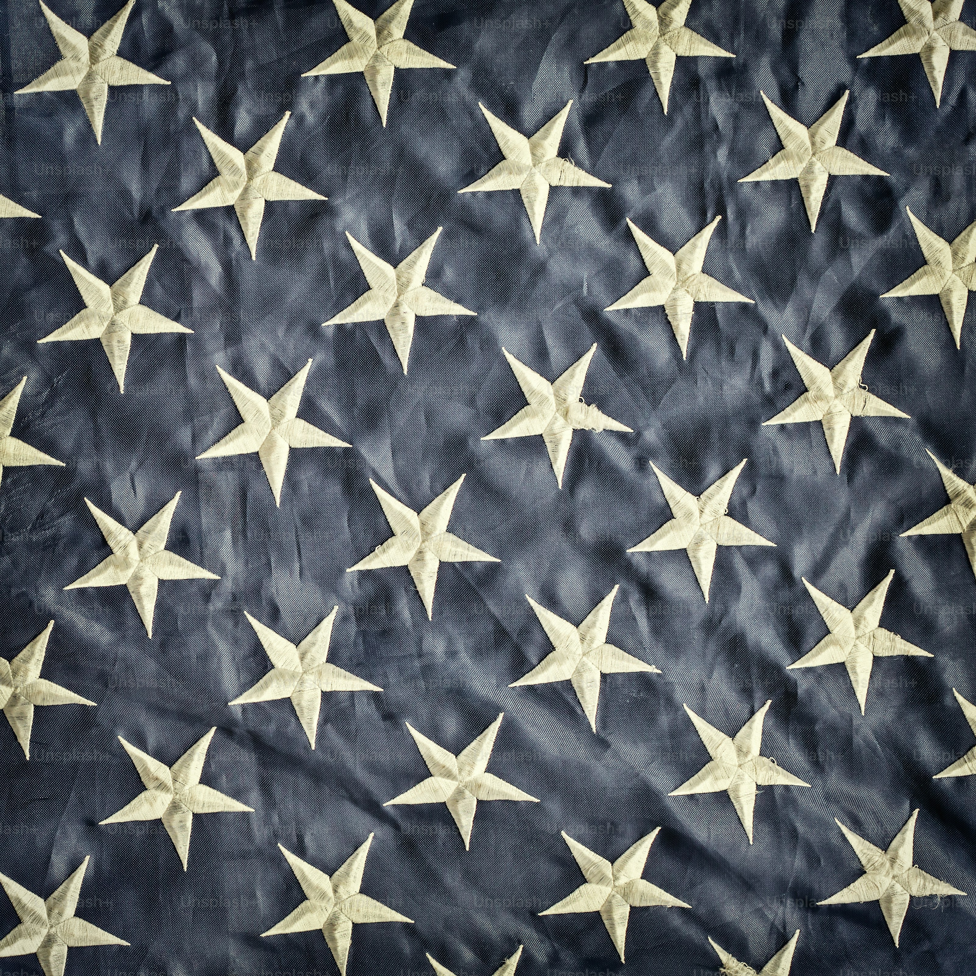 Retro styled image of the white stars against blue of the American flag