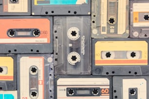 Assortment of different weathered vintage audio compact cassettes