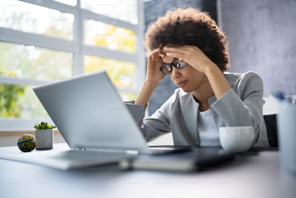 Stressed Sick African American Employee Woman At Computer