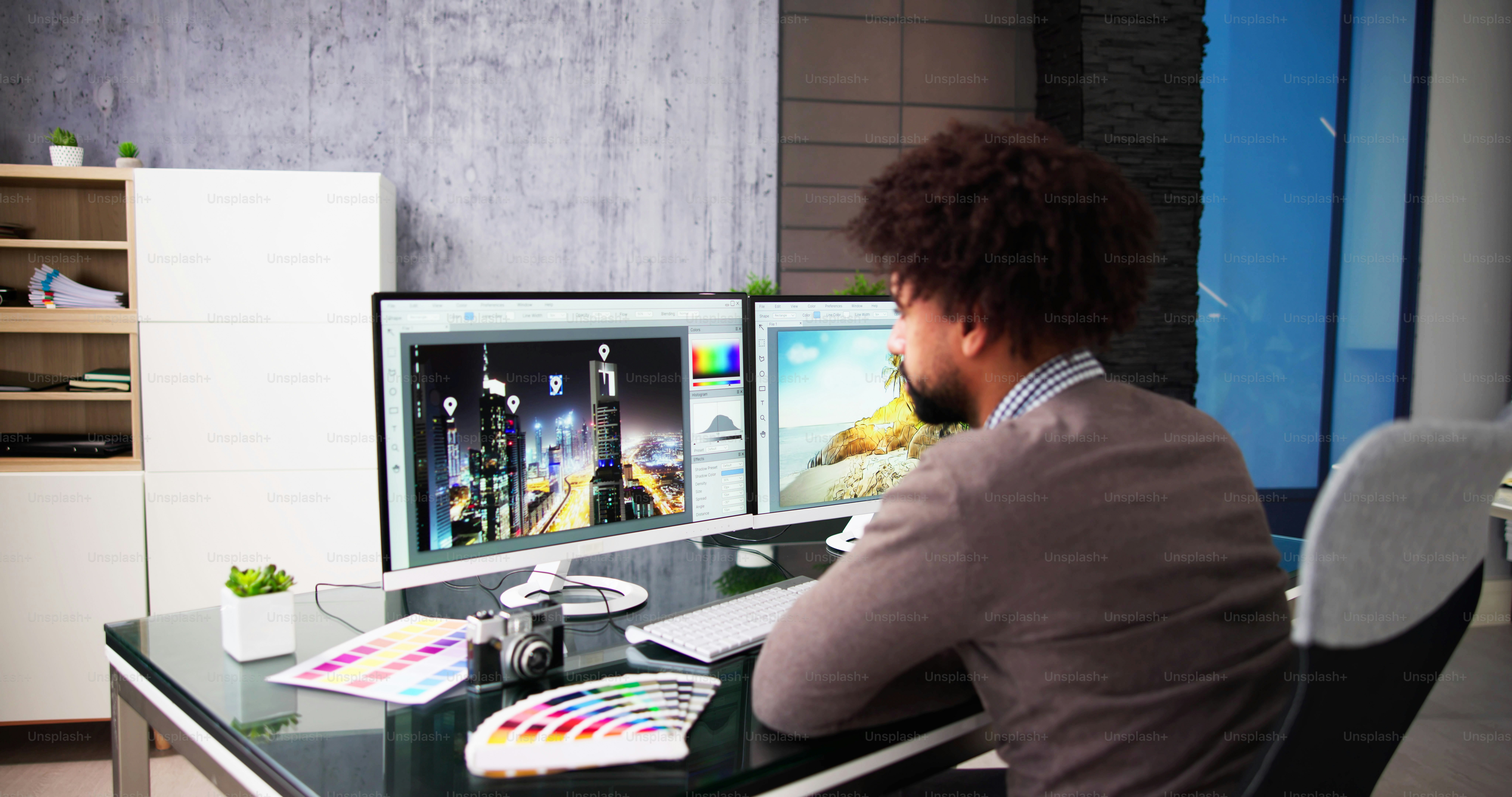 African Graphic Web Designer Using Design Editing Software