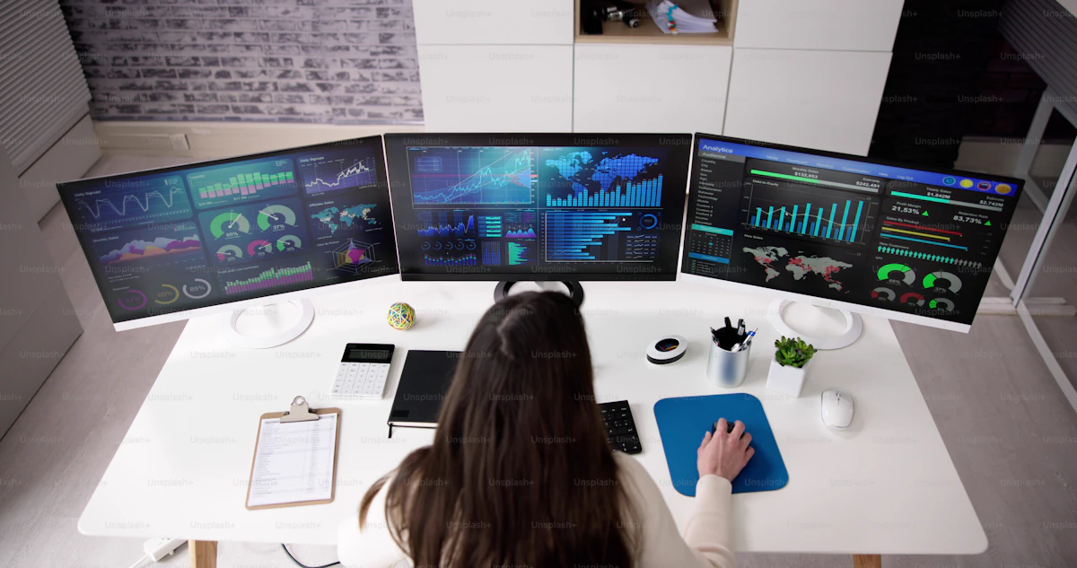 Dual-monitor professional workspace used for multitasking