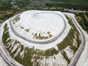 Aerial view of White Mountain near Russian town of Voskresensk - slagheap entirely composed of phosphogypsum mining wastes