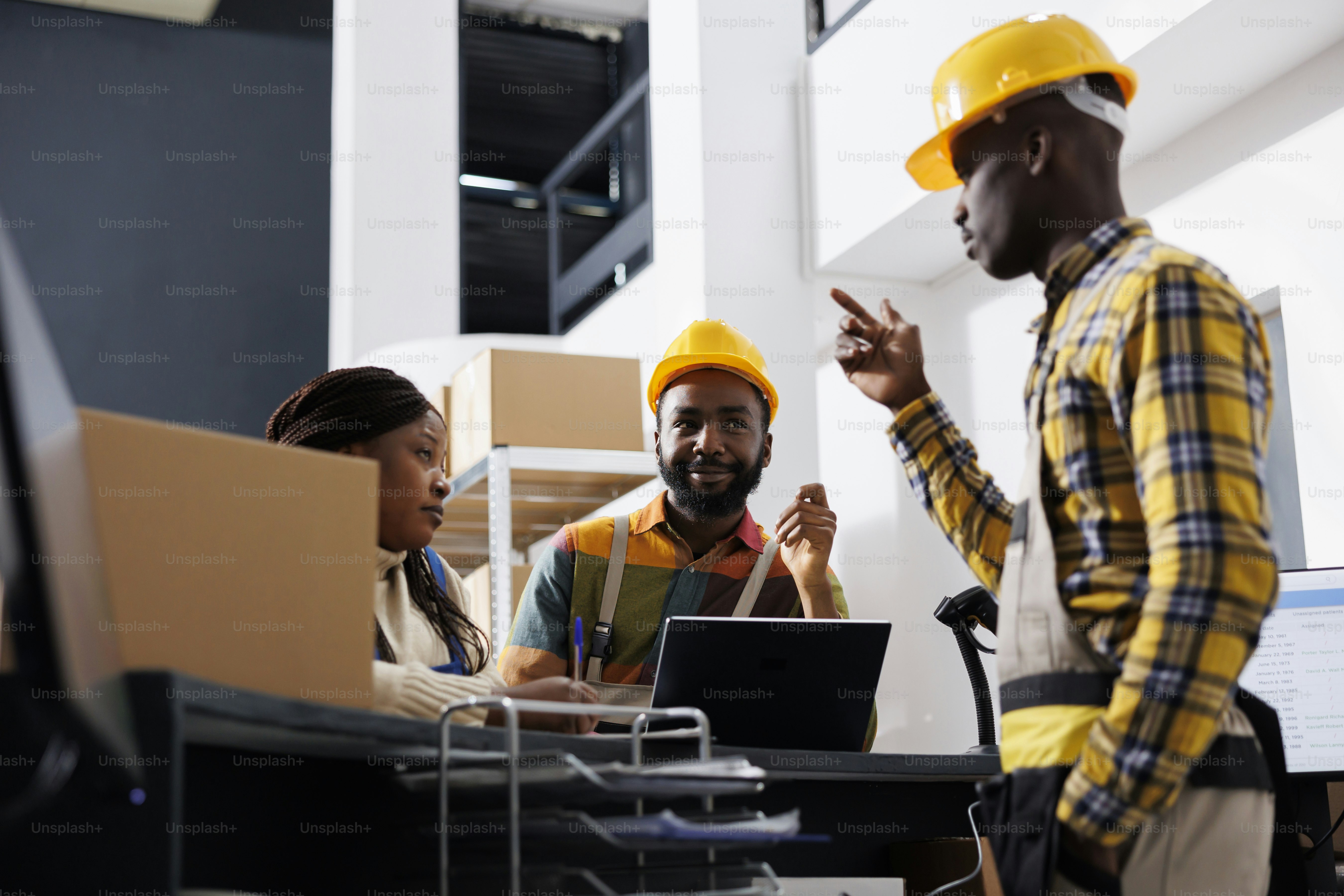 African american warehouse distribution manager doing inventory with ...