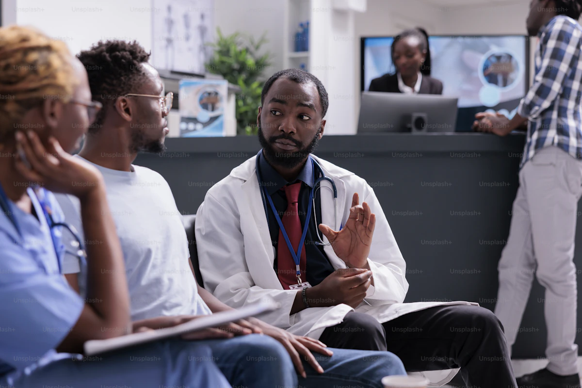 Patients and medical staff in a modern clinic reception and waiting area