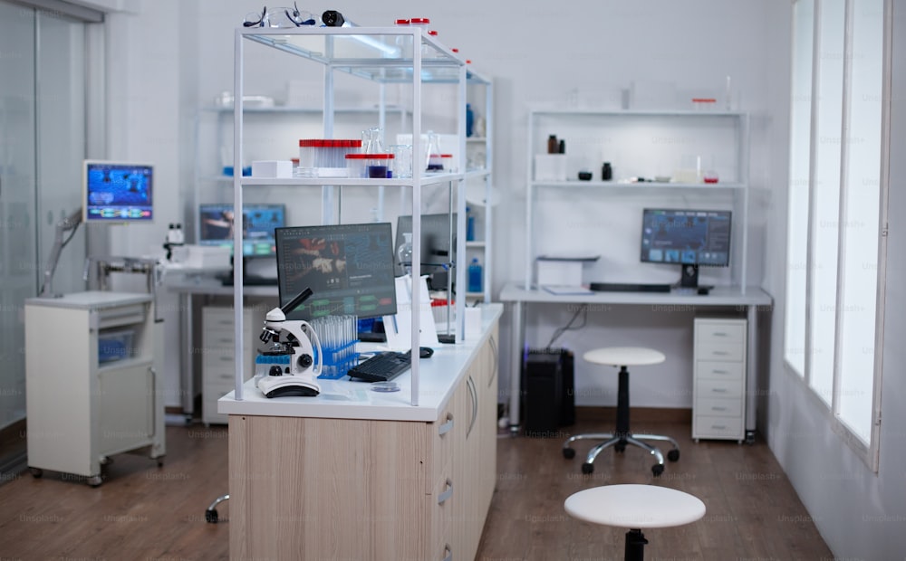 Interior of modern science laboratory with no people. Lab used for find a cure for dangerous virus.