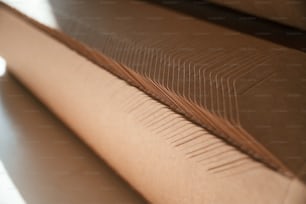 Close up focused view of wooden sheets that is lying down in a row.