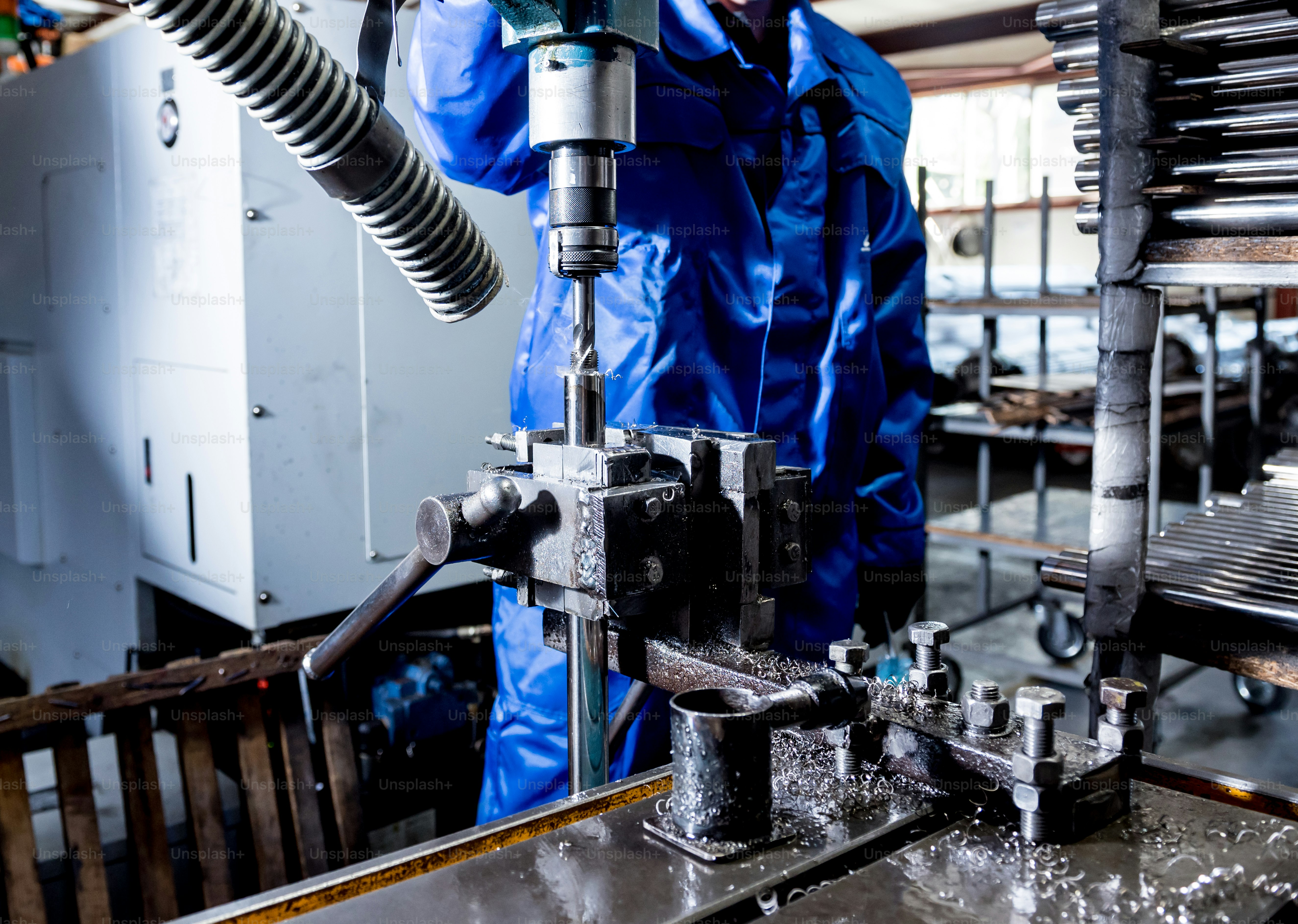 Drilling machine with drill bit for tapping