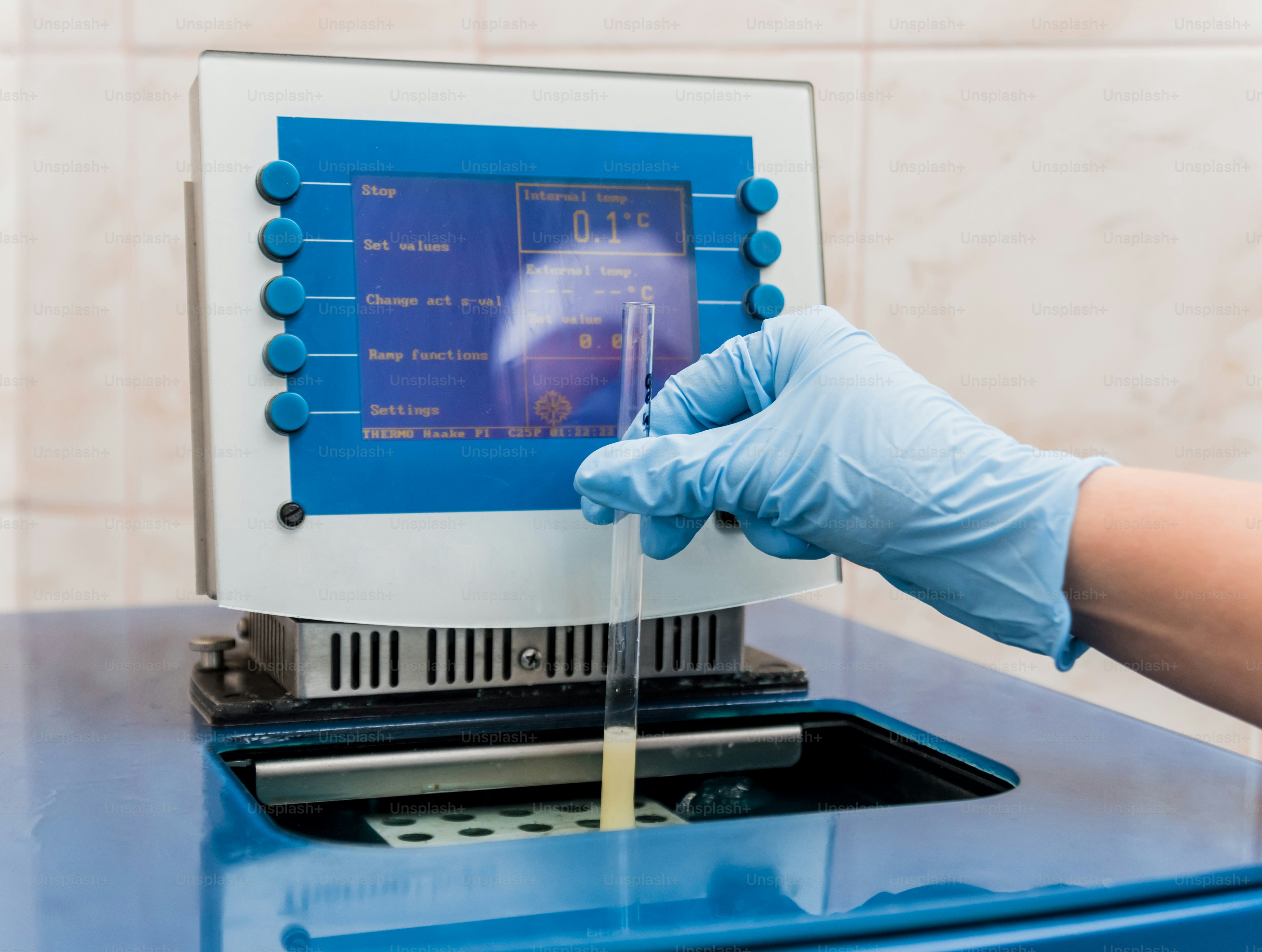 Natural oil quality control. In the industrial laboratory. Background ...
