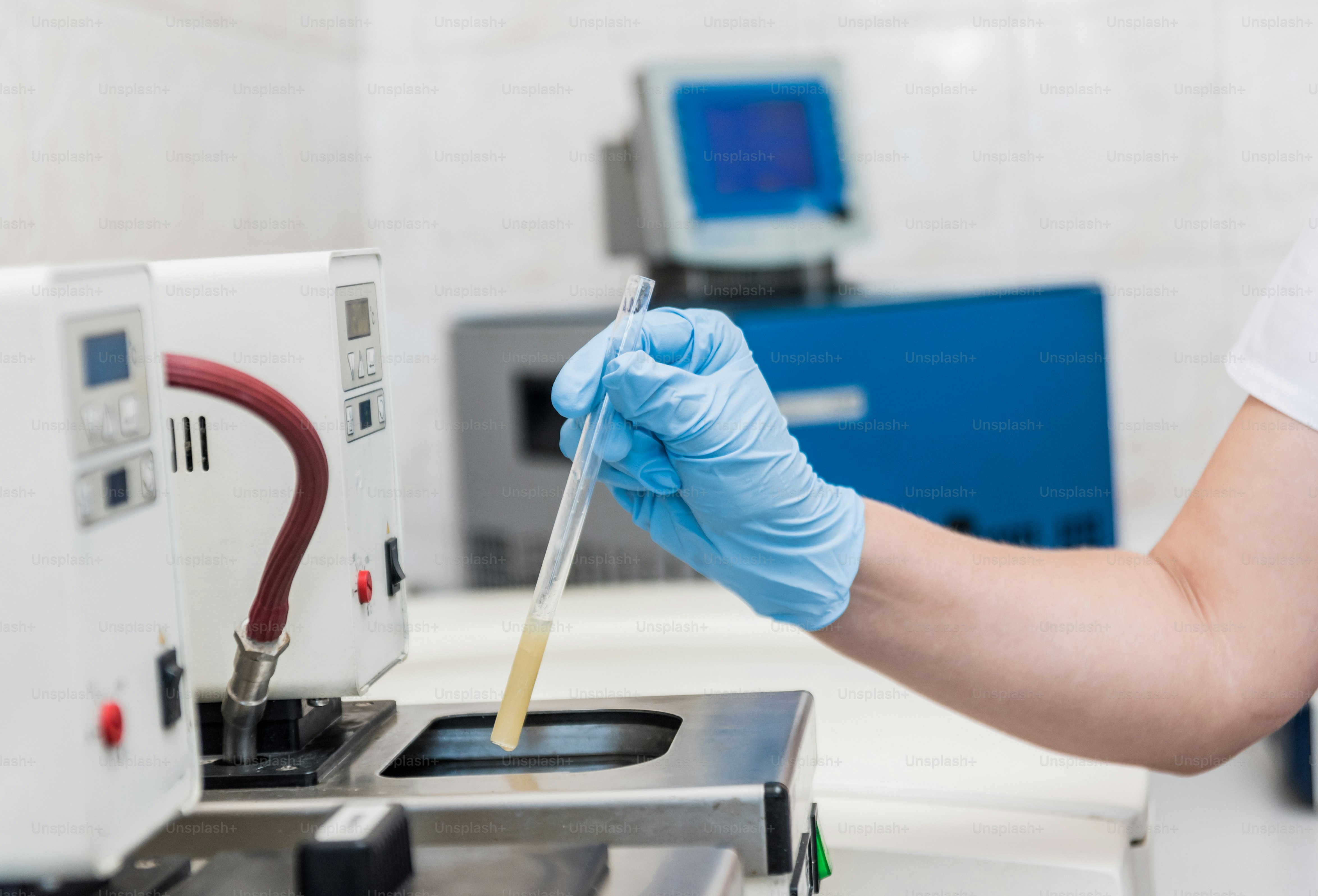Natural oil quality control. In the industrial laboratory. Background ...