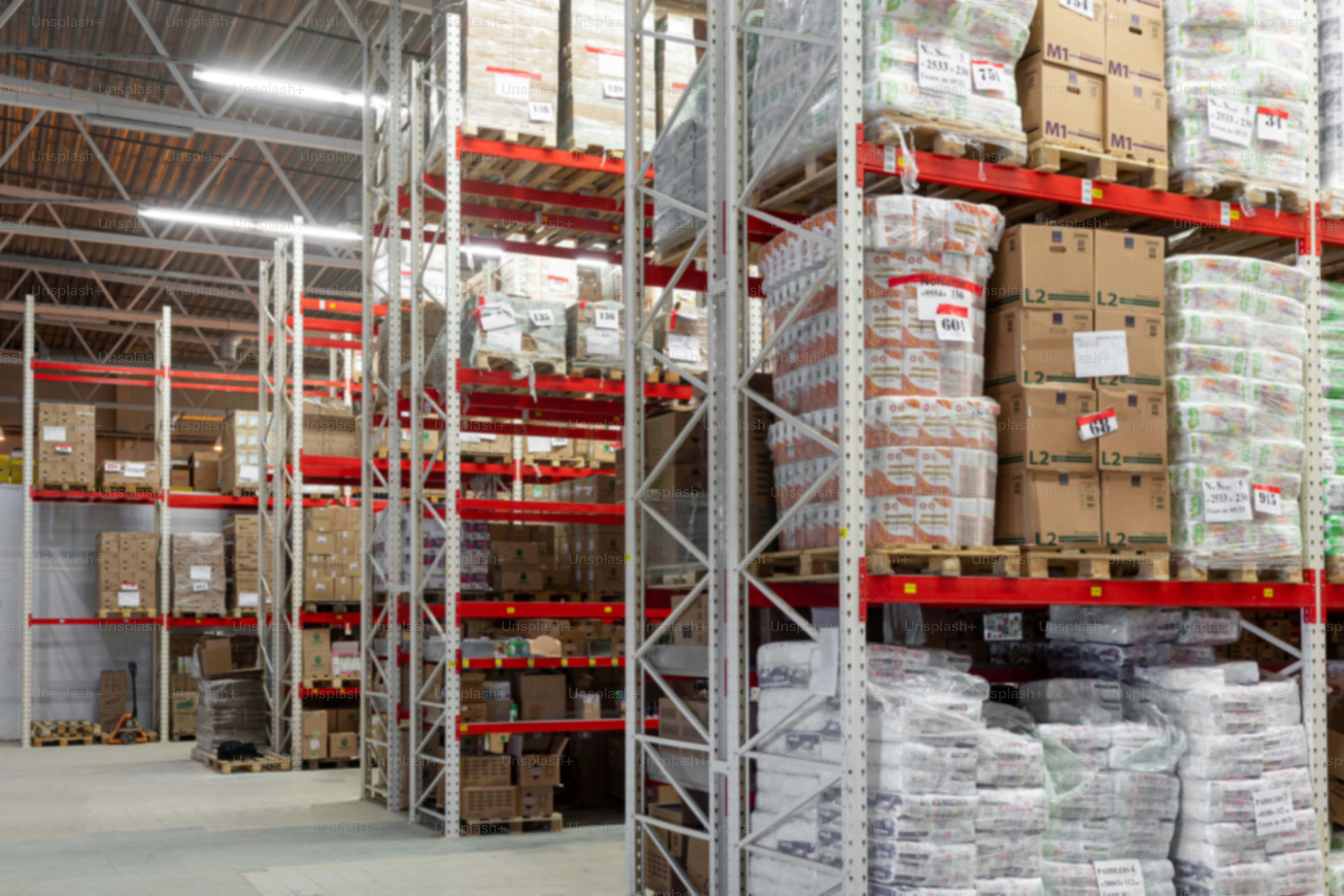 Warehouse automated logistics center with red racks. photo – Business ...