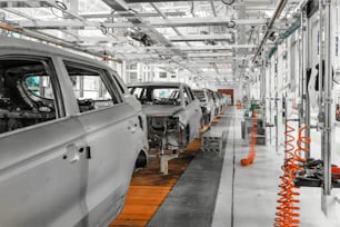 自動車生産のための工場。現代の自動車産業。電気自動車工場、コンベア。
