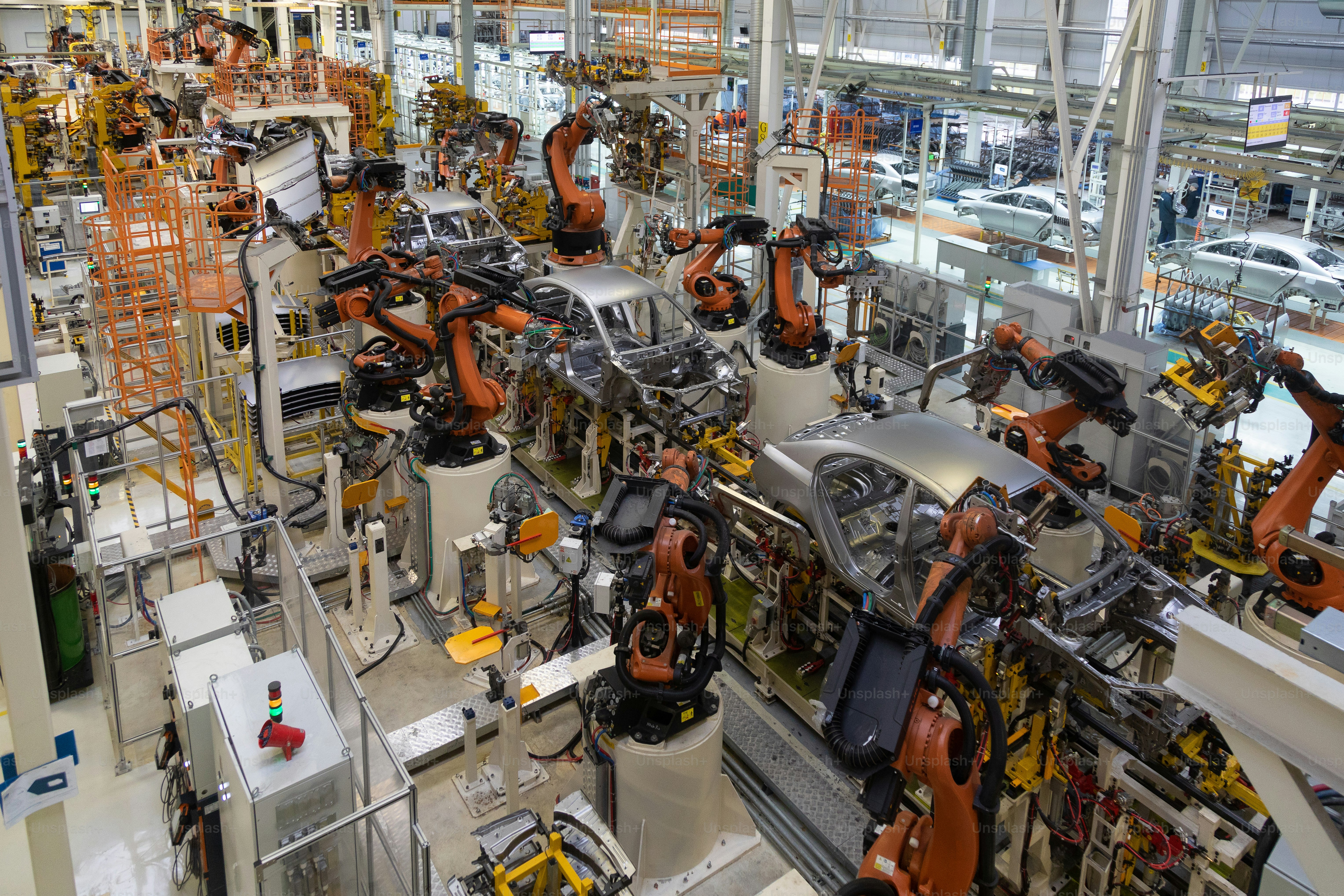 自動車の組み立ての最新技術。自動車産業の工場。機械の上面図の生産と組み立てのためのショップ。車の部品を溶接するプロセス