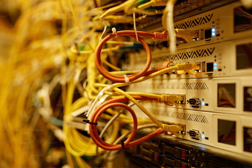 Background macro shot of cables and wires connected to servers, copy space