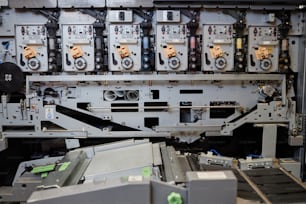 Tech background image of industrial printing machines in workshop