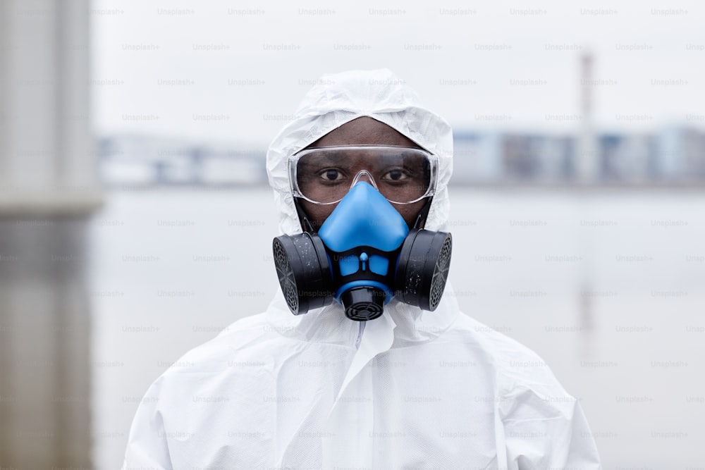 Portrait of African-American man wearing protective gear and looking at camera outdoors