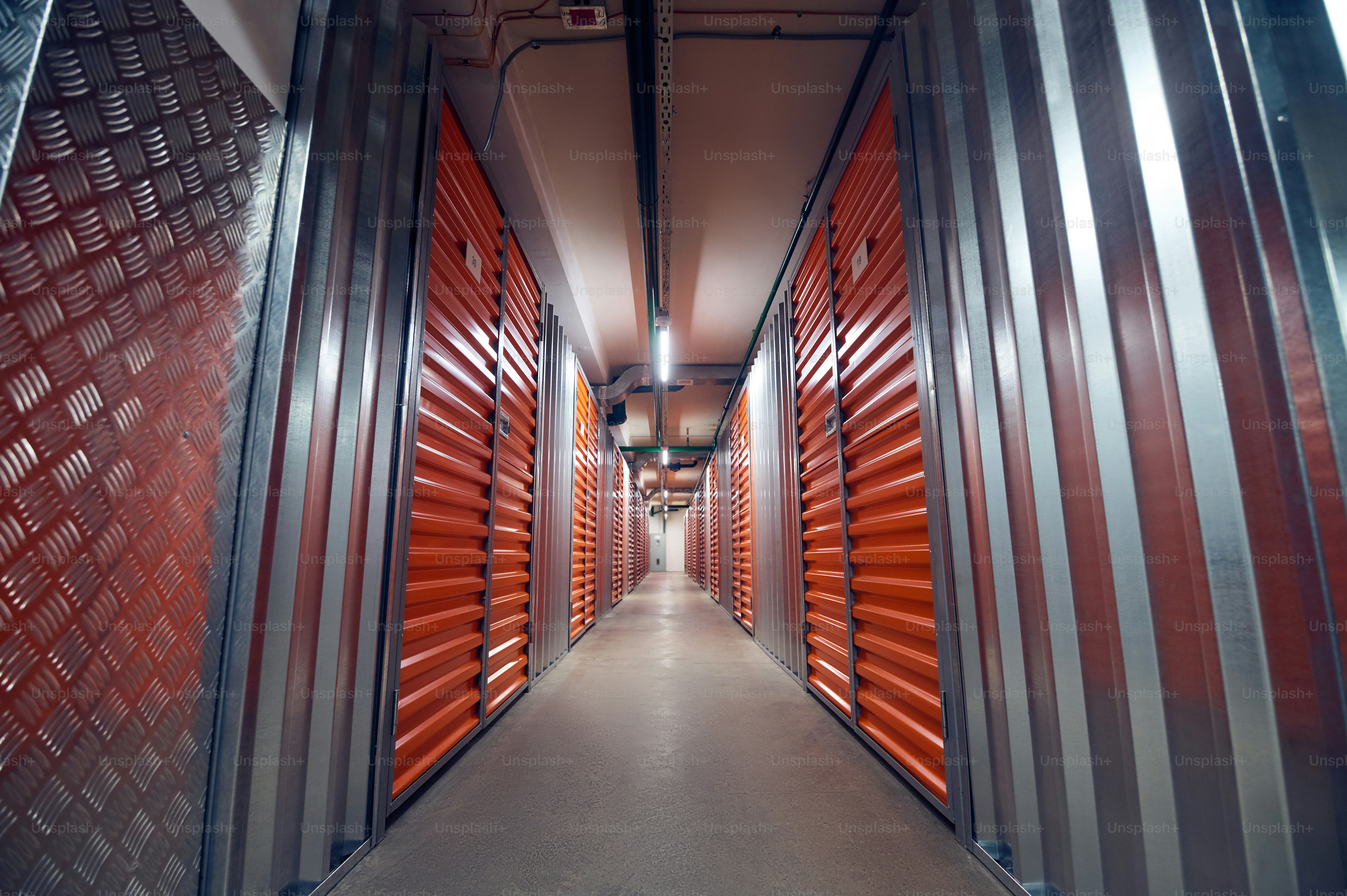 Storage containers. Modern clean lighted secure area with two neat rows of storage containers