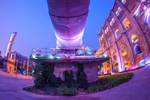 Factory buildings and industrial equipment in the evening