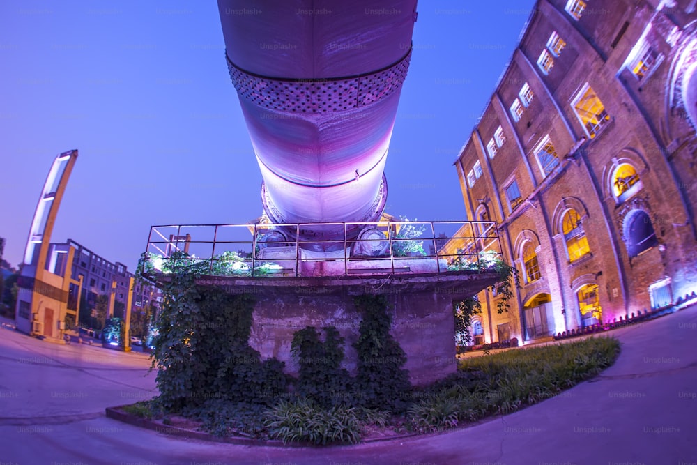 Factory buildings and industrial equipment in the evening