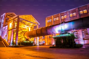 Factory buildings and industrial equipment in the evening