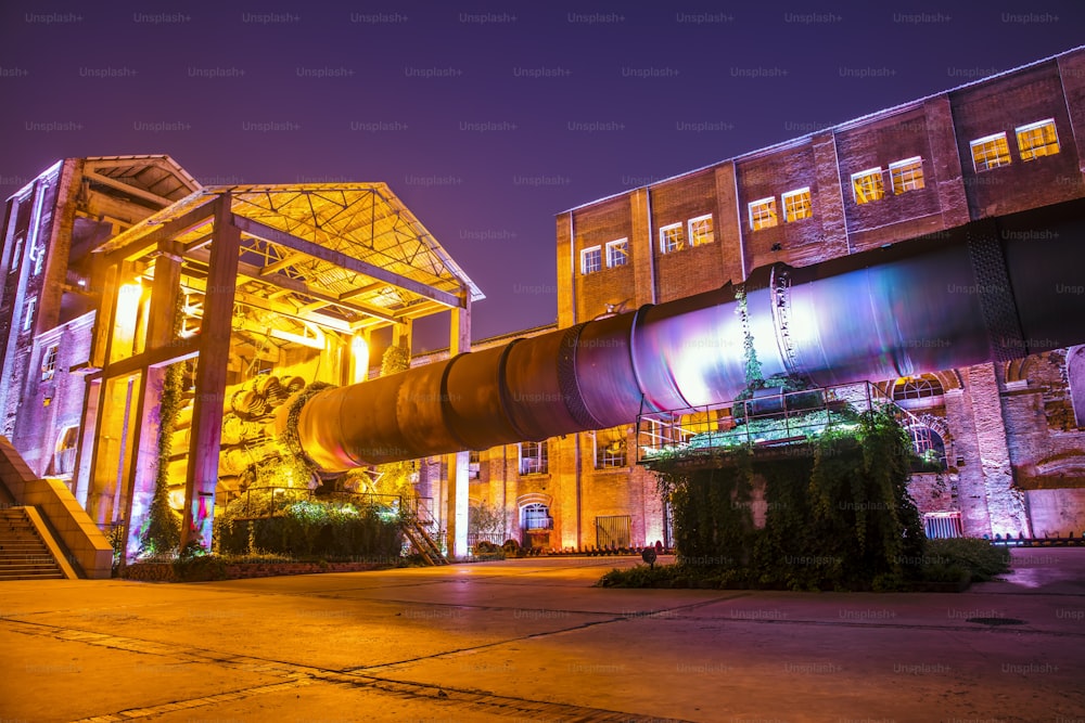 Factory buildings and industrial equipment in the evening