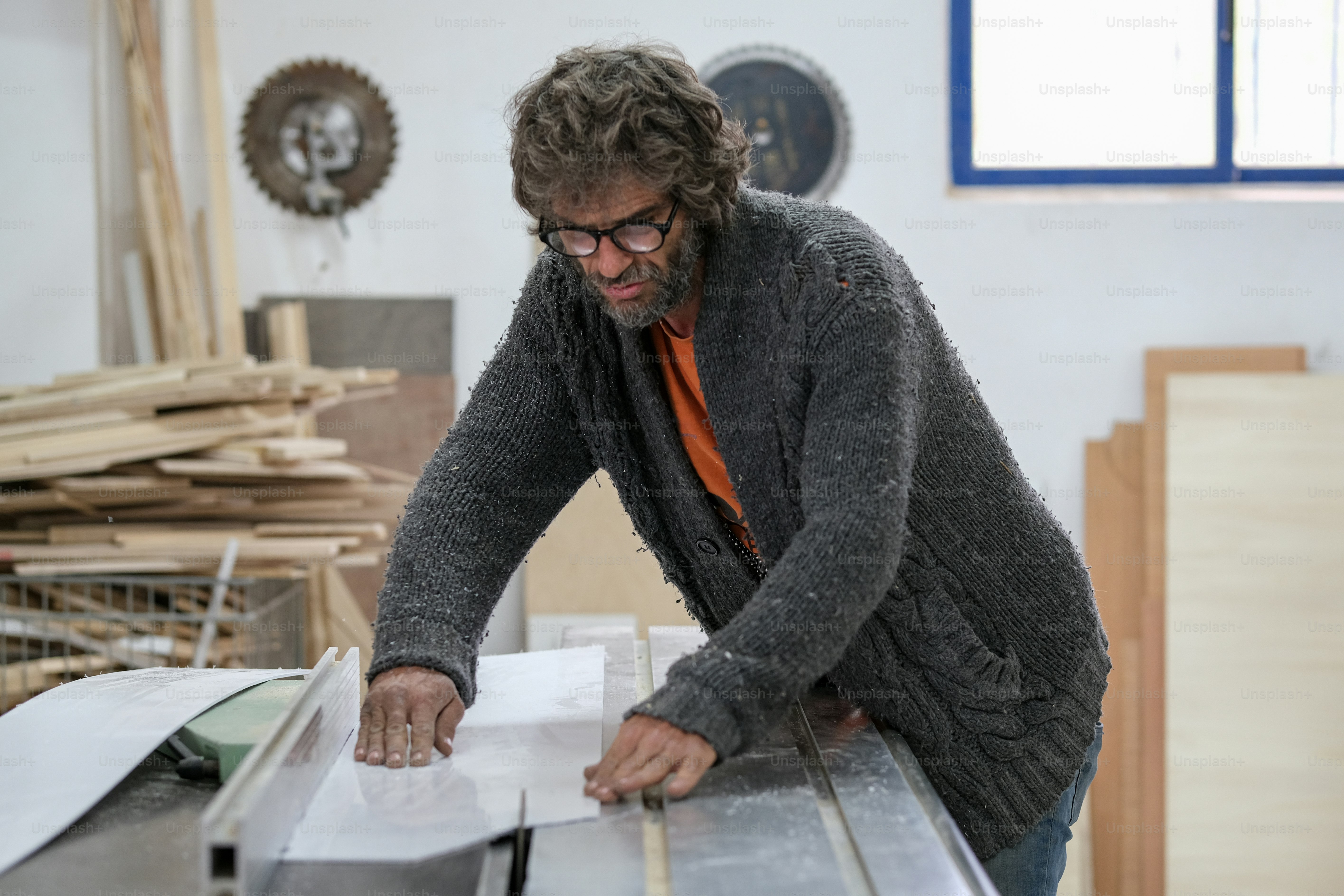 a man working on a piece of wood