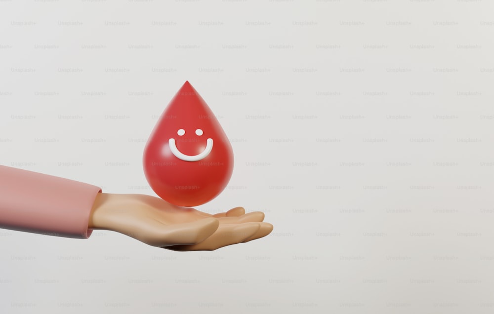 Mano che tiene l'icona della goccia di sangue con il volto sorridente consegnato su sfondo bianco. Volontariato per aiutare a donare il sangue in occasione della Giornata Mondiale del Donatore di Sangue. Illustrazione di rendering 3D.