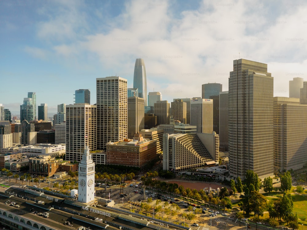 a view of a city with a train on the tracks