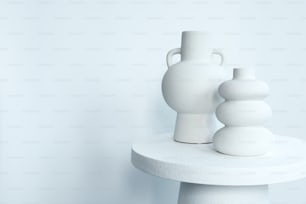 zwei weiße Vasen, die auf einem weißen Tisch sitzen