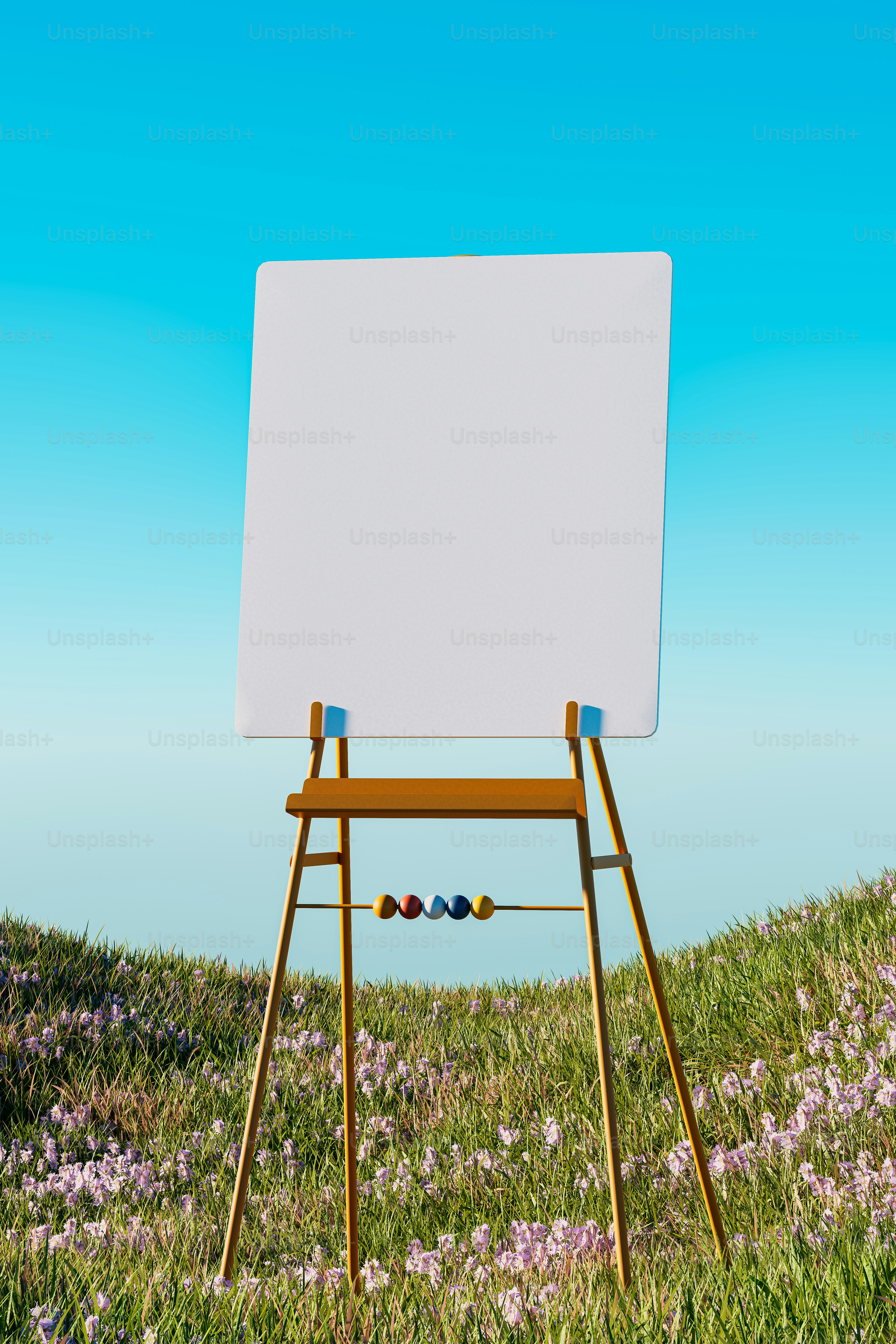 un chevalet en bois posé au sommet d’un champ verdoyant