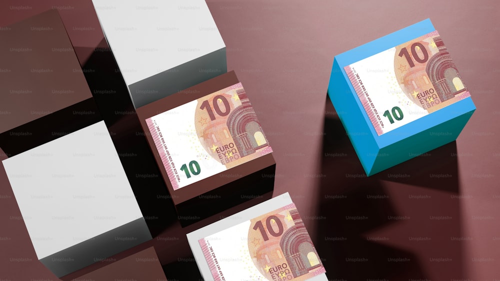 a set of ten thousand euros bills on a pink background