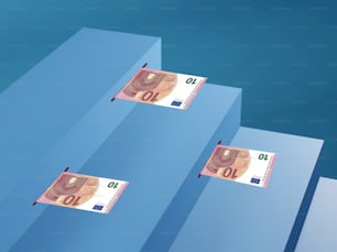 Tres pilas de dinero flotando sobre un fondo azul