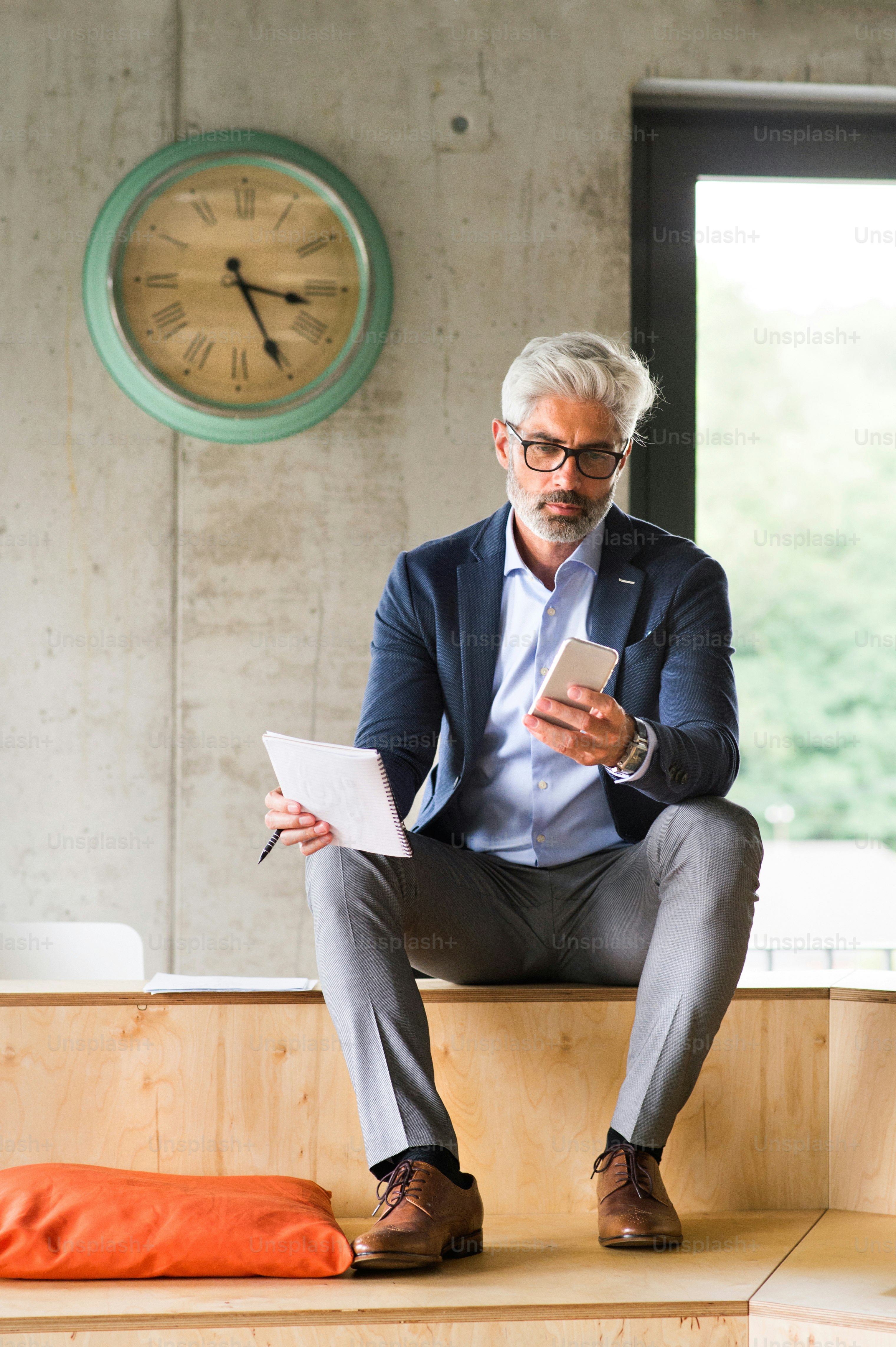 HR professional reviewing time and attendance software records on a laptop dashboard