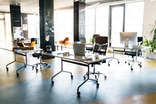 Big bright empty modern office after work. The interior of working office space.