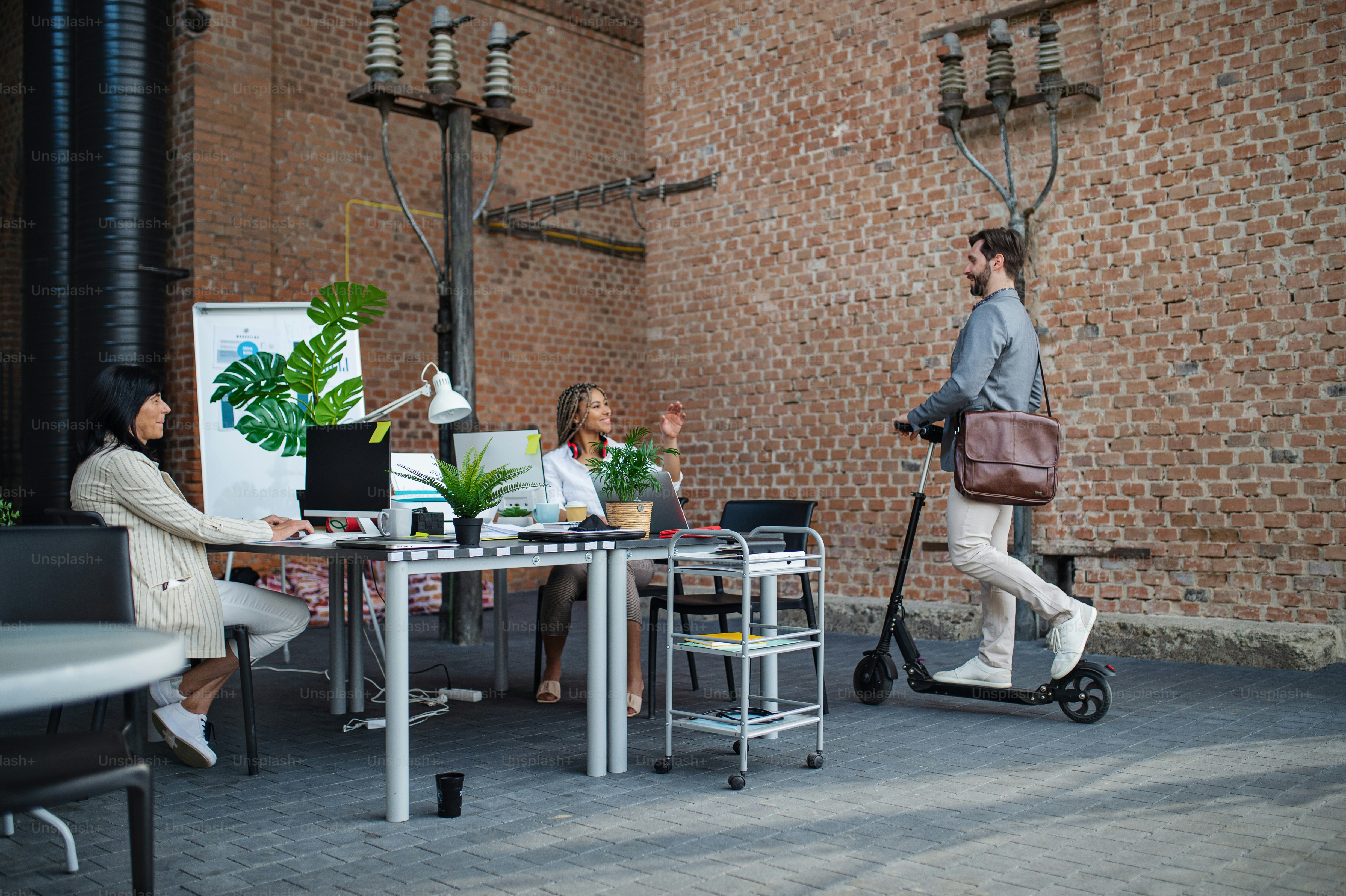 Owner practicing scooter battery care while charging an electric mobility device indoors