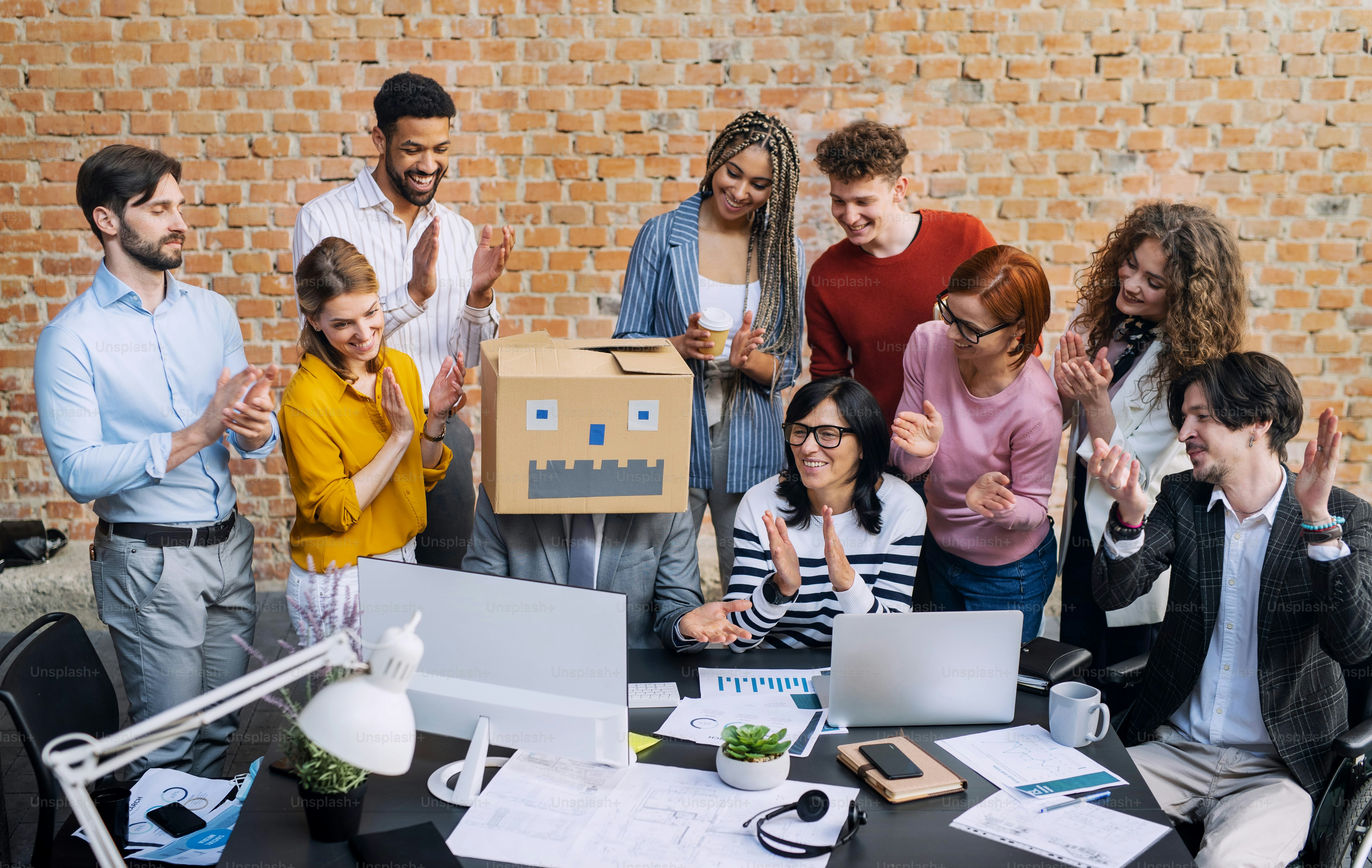 A group of entrepreneurs architects having fun indoors in office ...