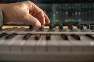 a close up of a person's hand on a keyboard