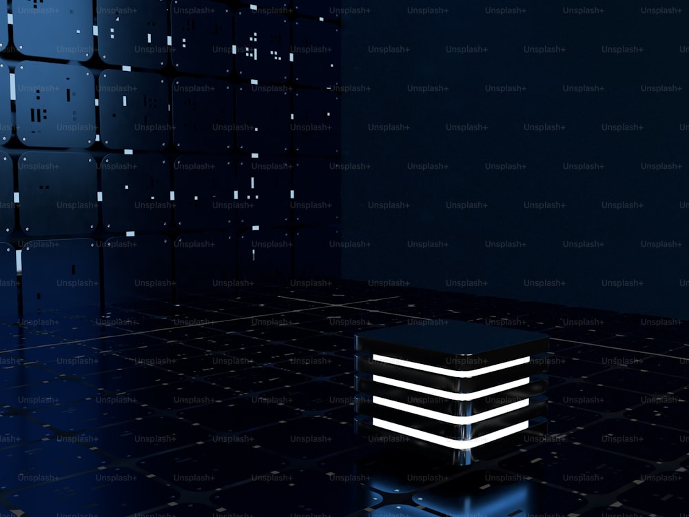 a black and white cube sitting on top of a tiled floor