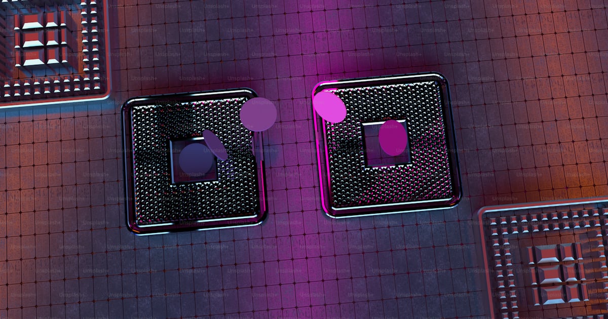 A couple of square shaped objects on a table photo – Machine learning ...