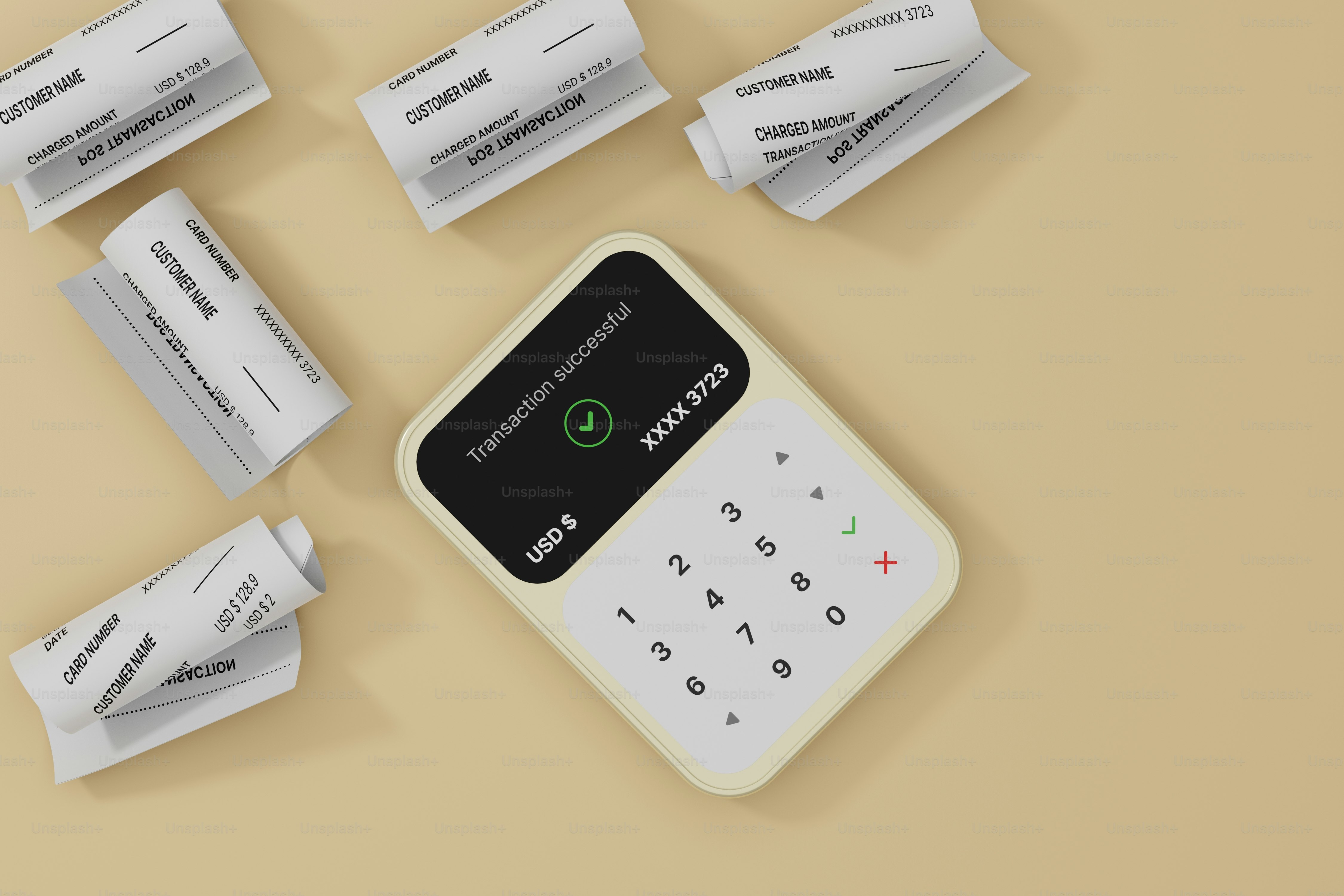 Una calculadora sentada encima de una mesa junto a algunos papeles