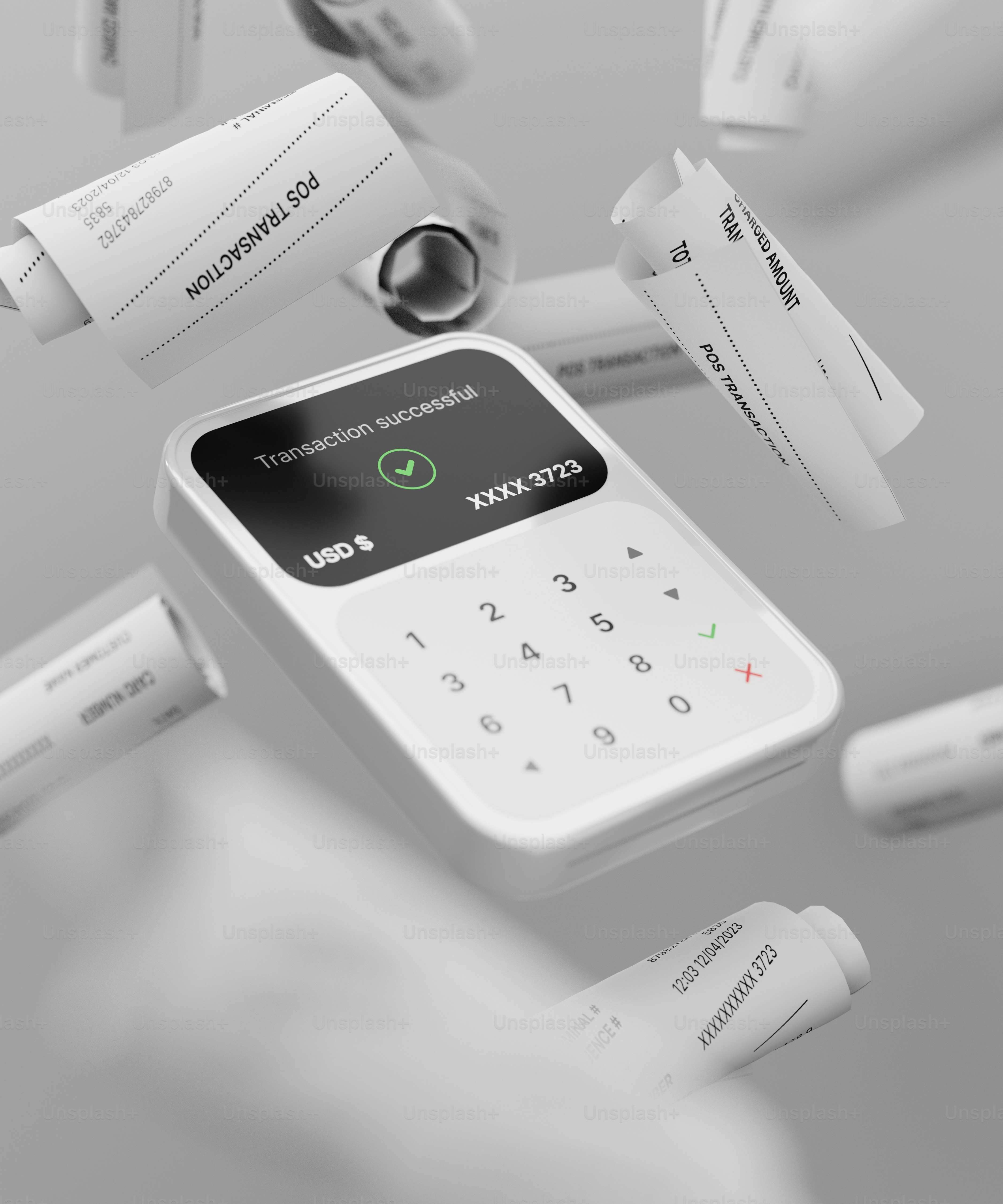 un dispositivo electrónico blanco con un botón verde