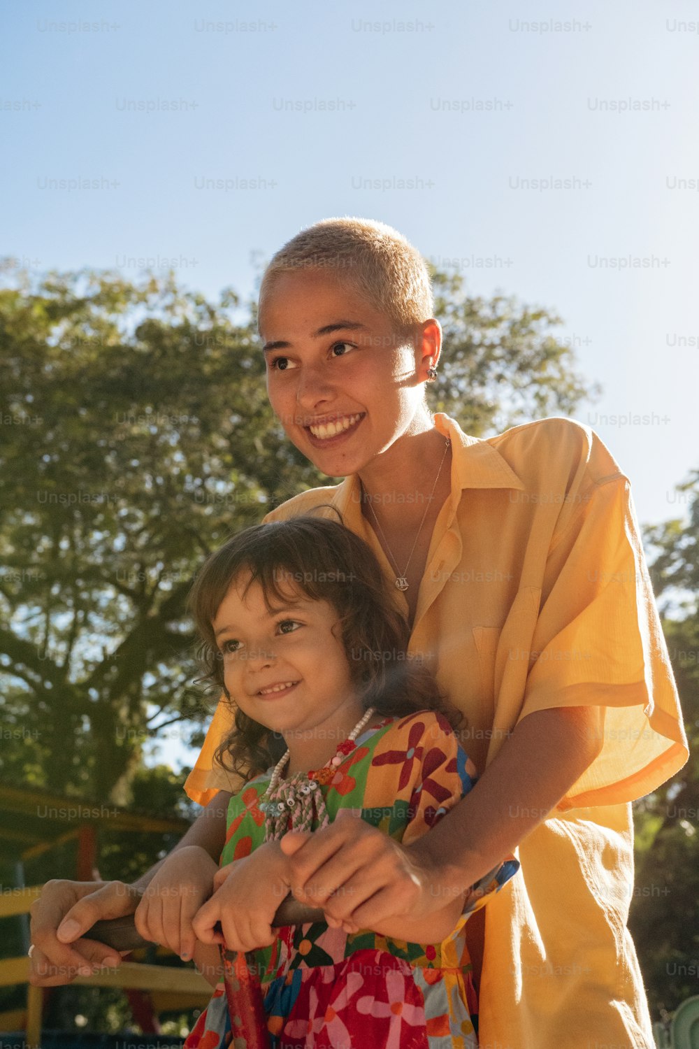 a boy and a girl standing next to each other