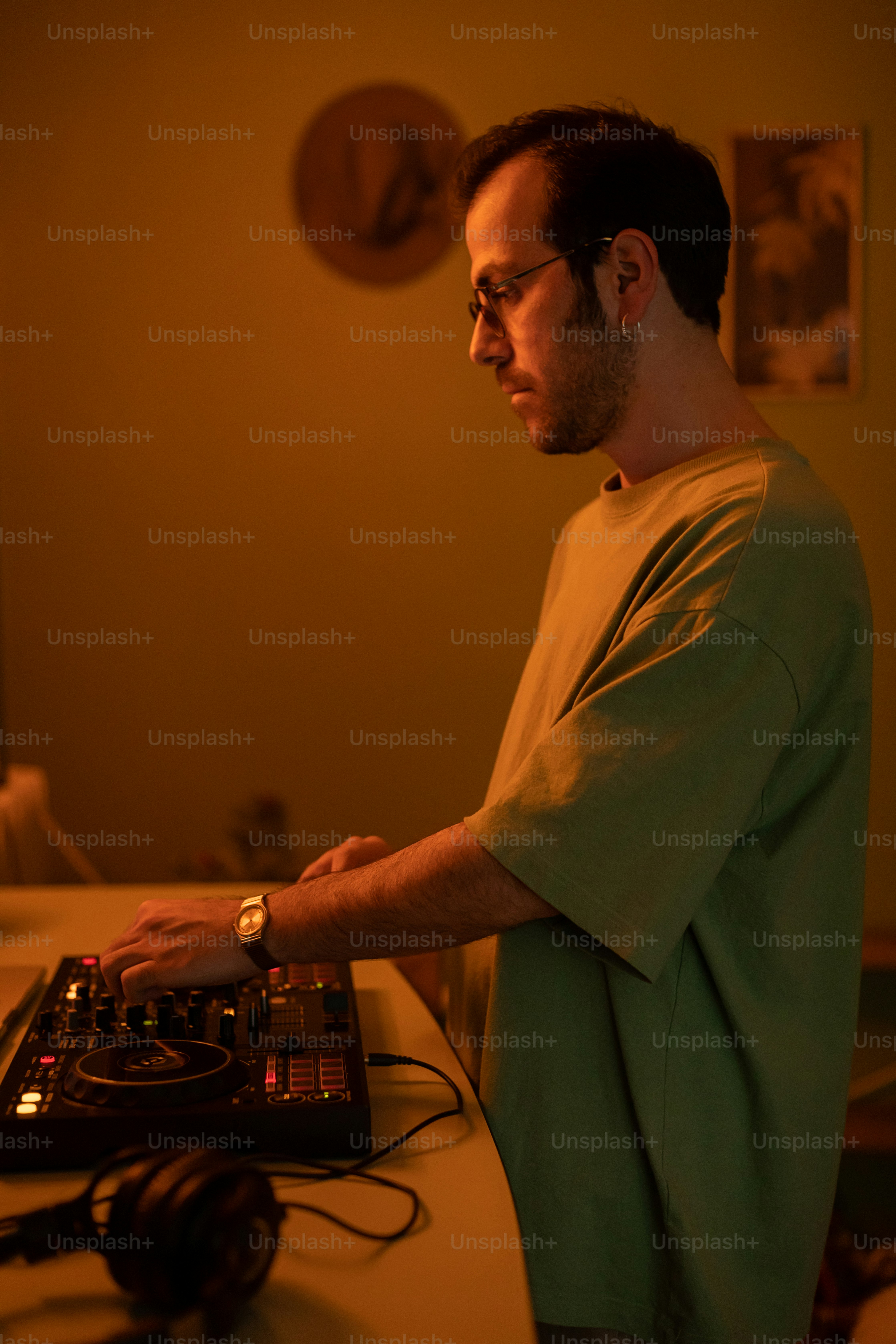 a man standing in front of a laptop computer
