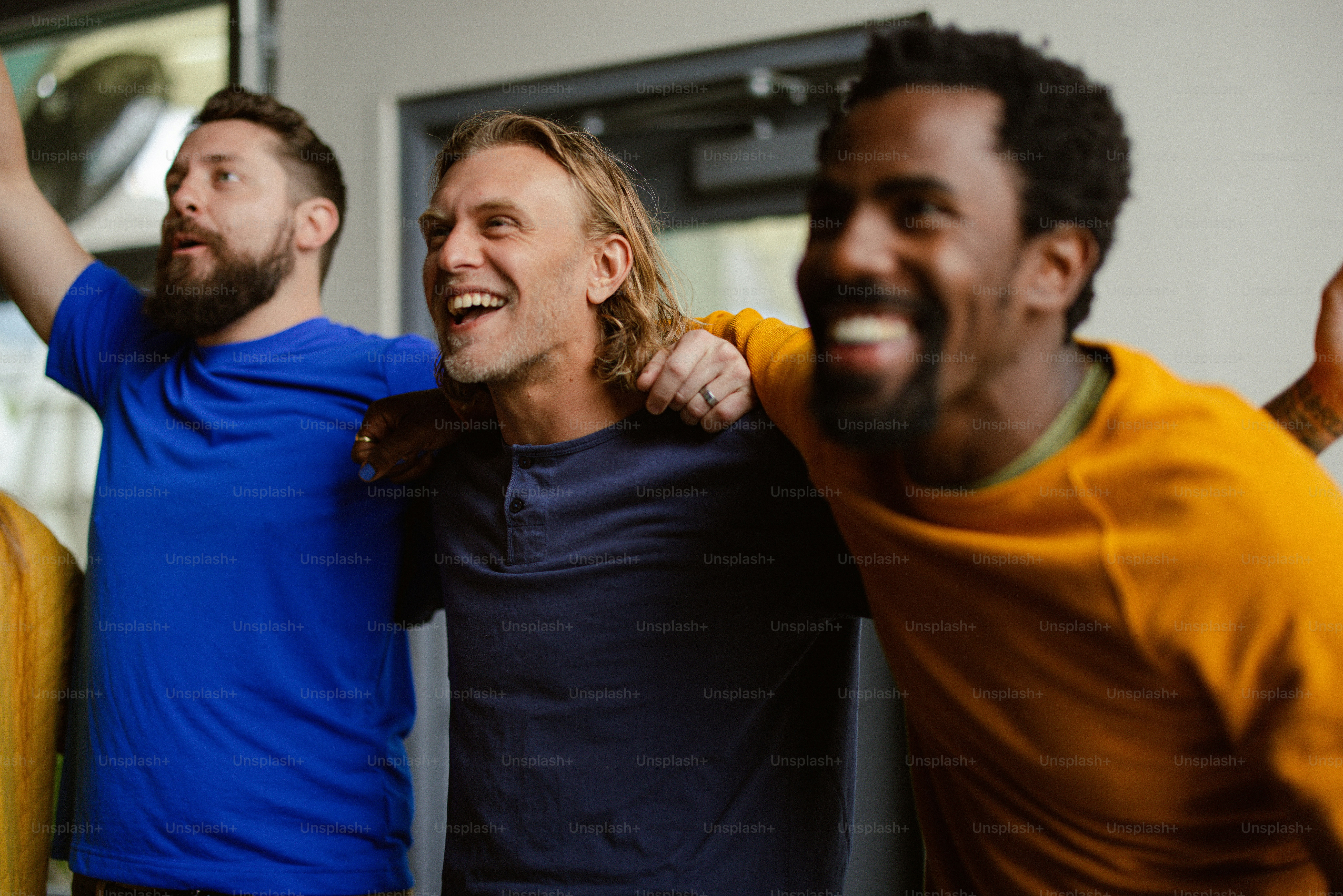 a group of men standing next to each other