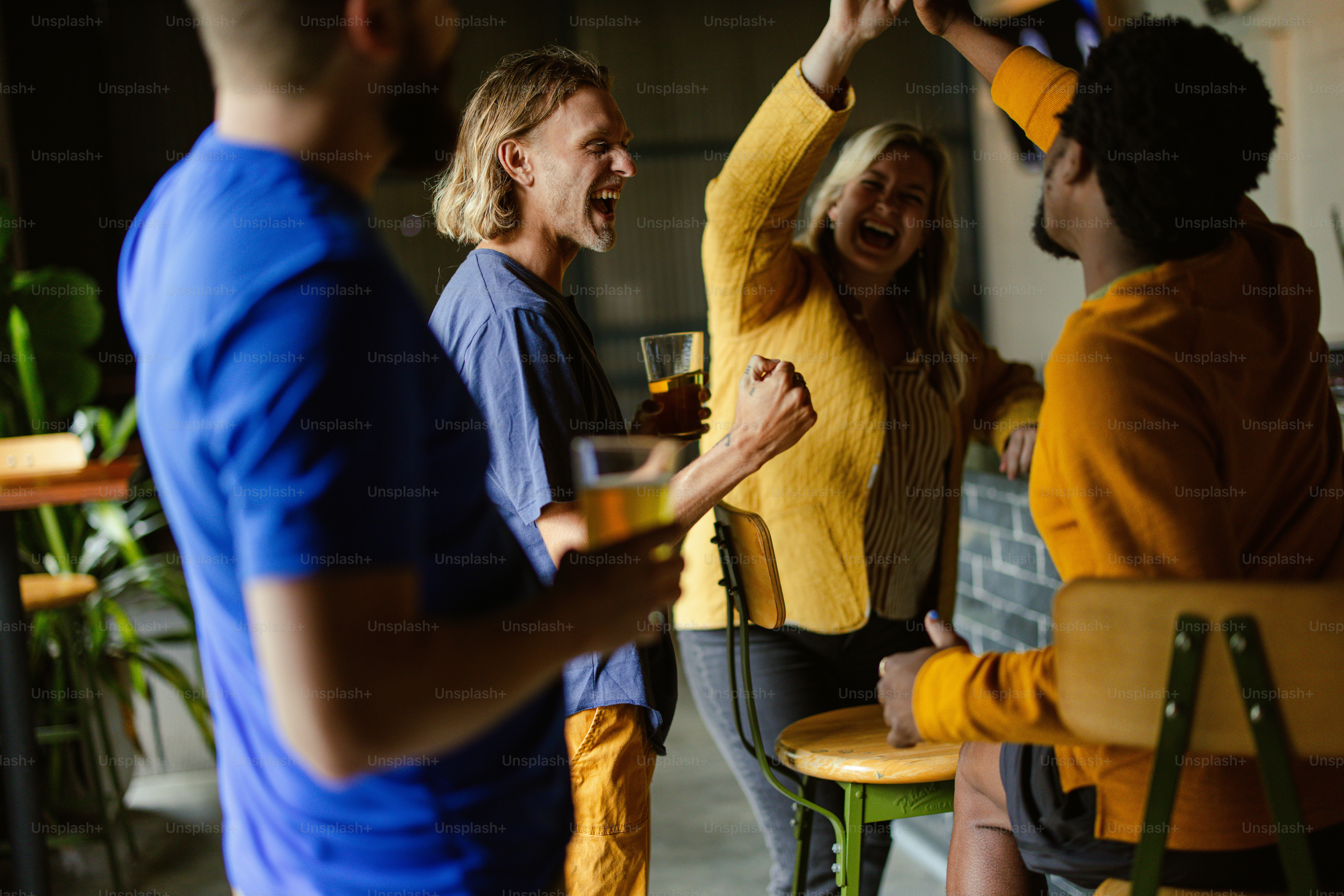 A group of people standing around each other photo – Crowd Image on ...